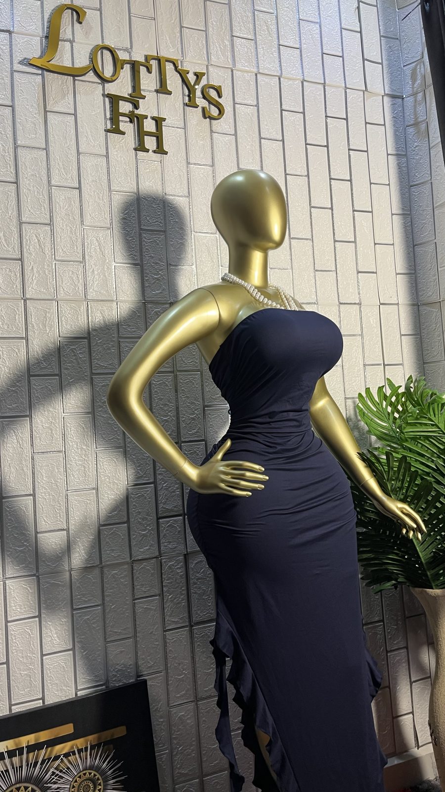The NAVY RUFFLE Strapless  Dress