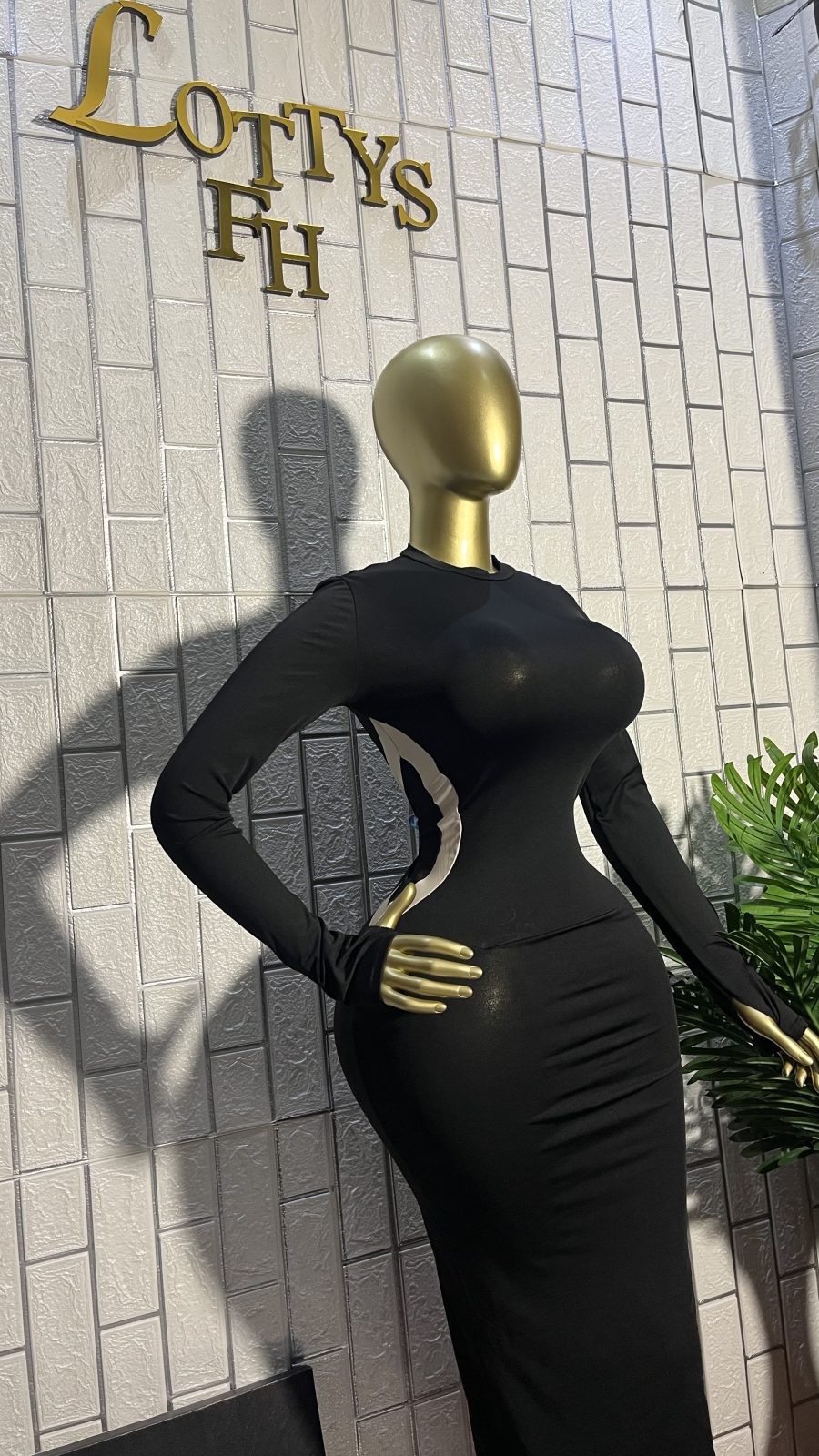 The BLACK SLIM-THICK Curve Cut Maxi Dress