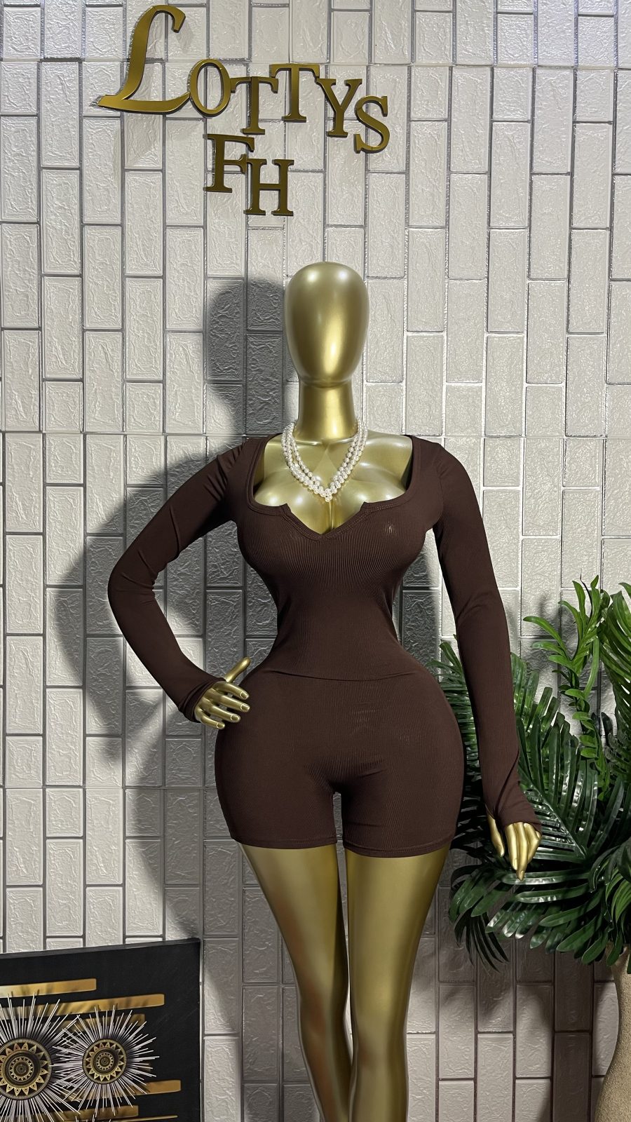 The MOCHA BADDIE Notch Neck Romper