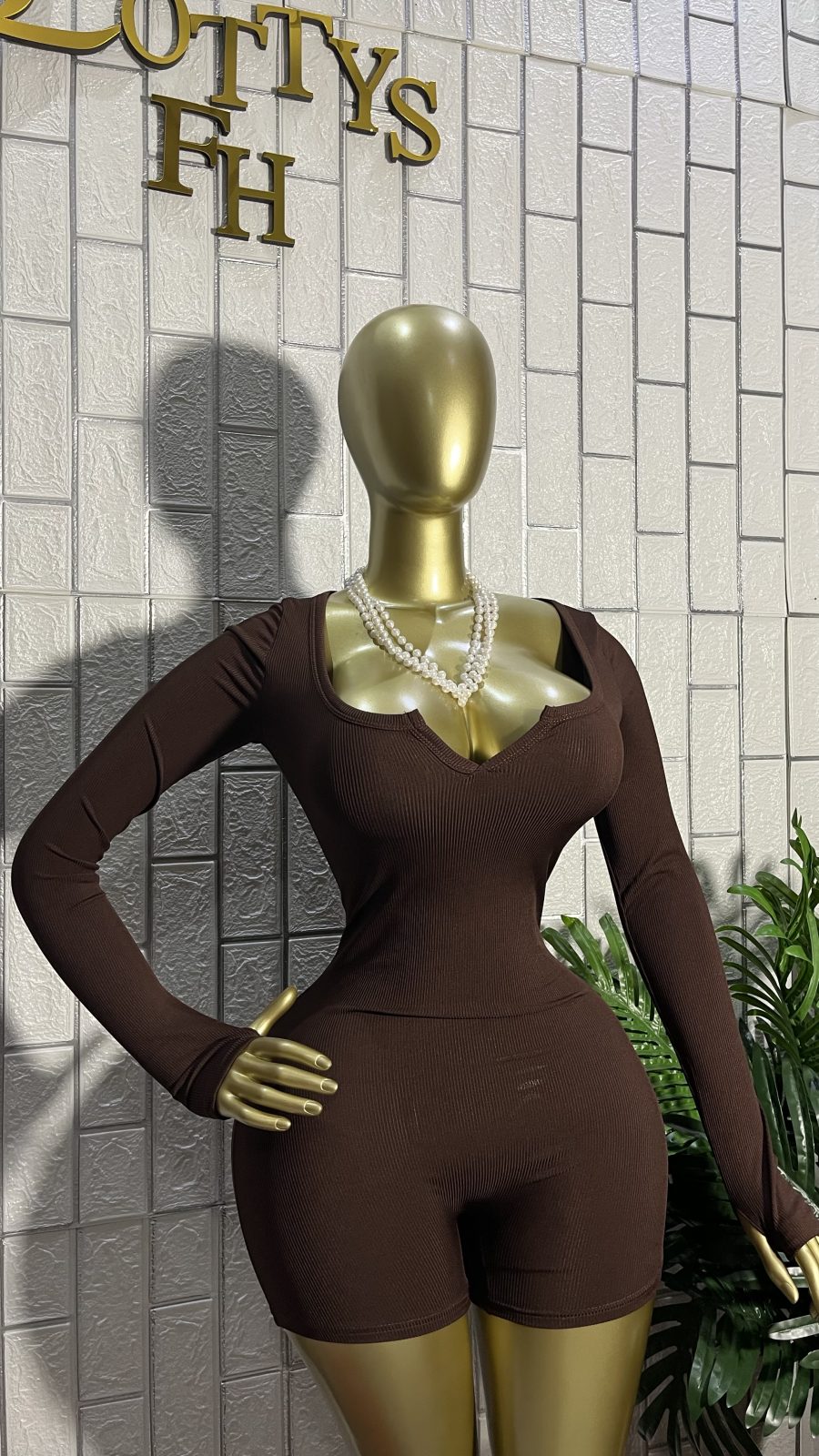 The MOCHA BADDIE Notch Neck Romper