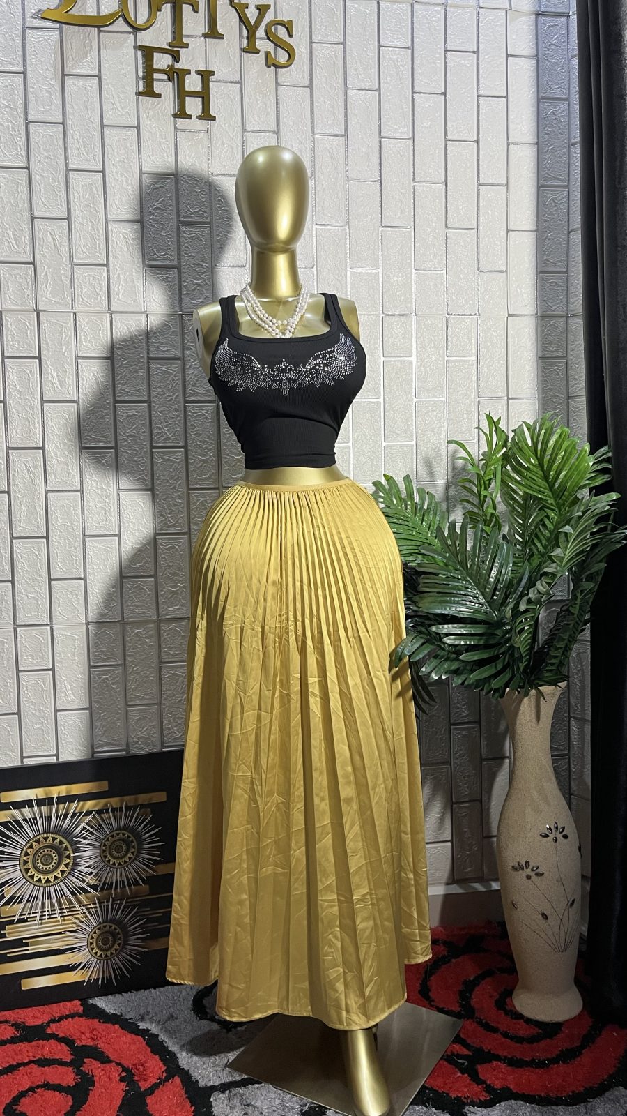 The GOLDEN GODDESS Pleated Flare Maxi Skirt