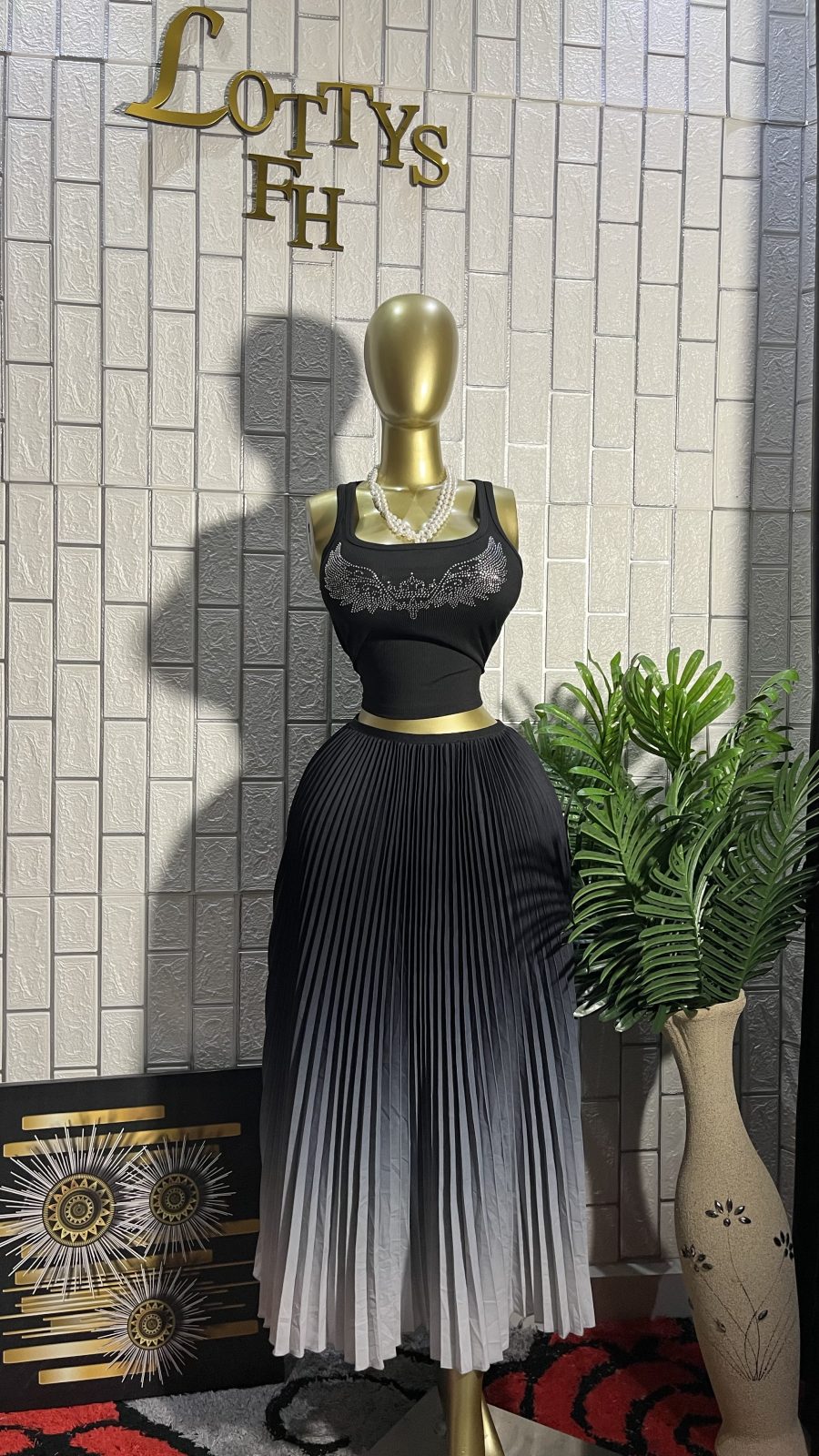 The OMBRÉ MUSE Pleated Flare Midi Skirt