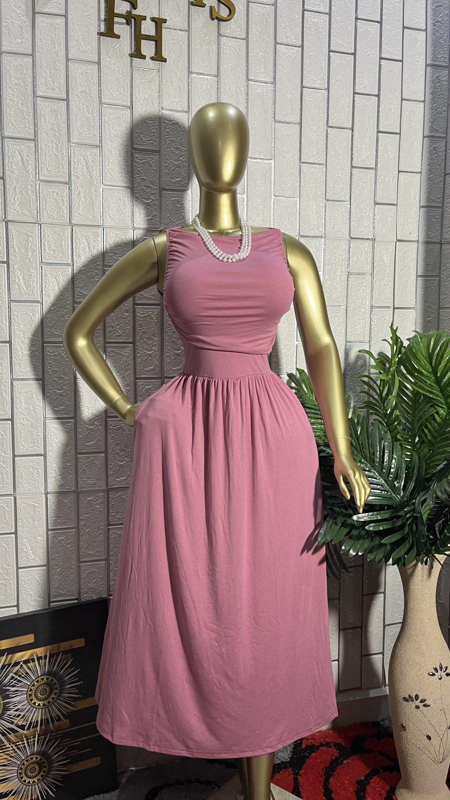 The BLUSH PLEAT Sleeveless Midi Dress