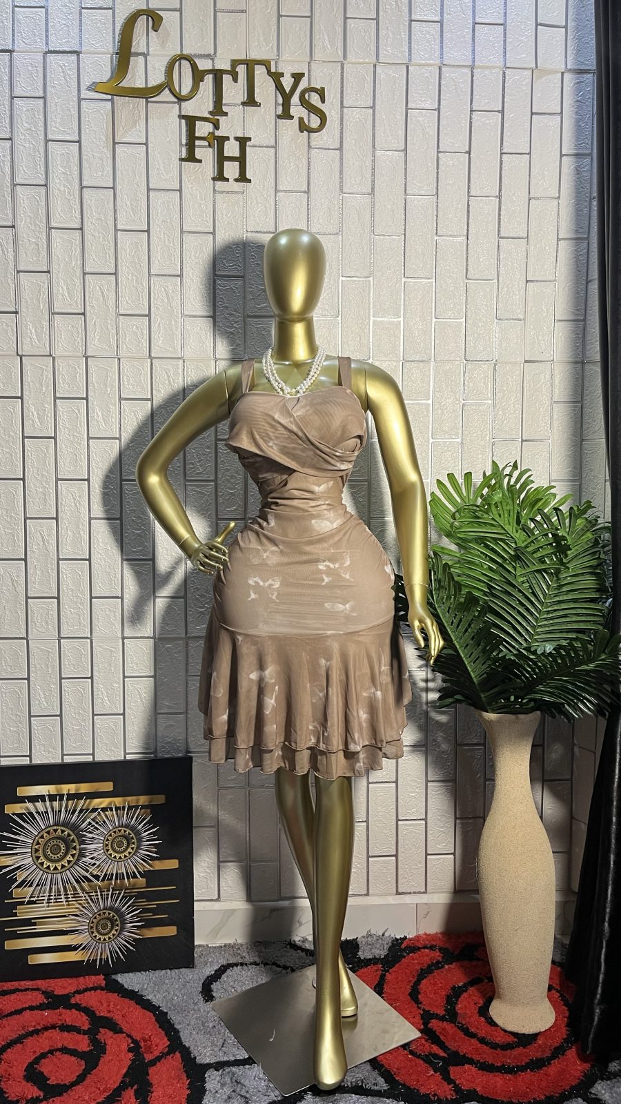 The TAUPE CLOUD Ruffle Flare Mini Dress
