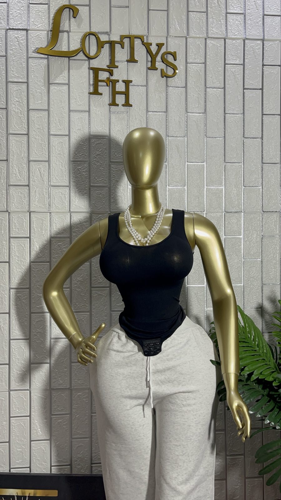 The ONYX SNATCH Scoop Neck Bodysuit Top