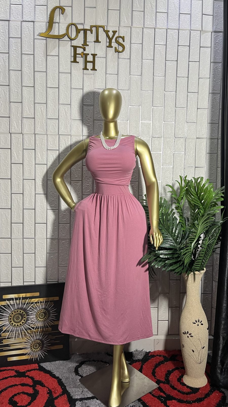The BLUSH PLEAT Sleeveless Midi Dress
