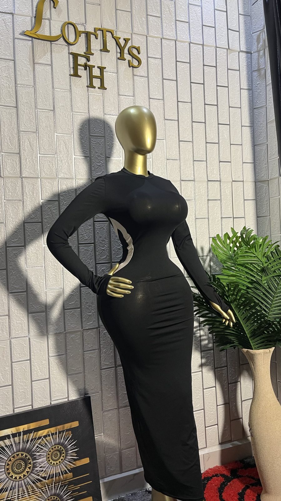 The BLACK SLIM-THICK Curve Cut Maxi Dress