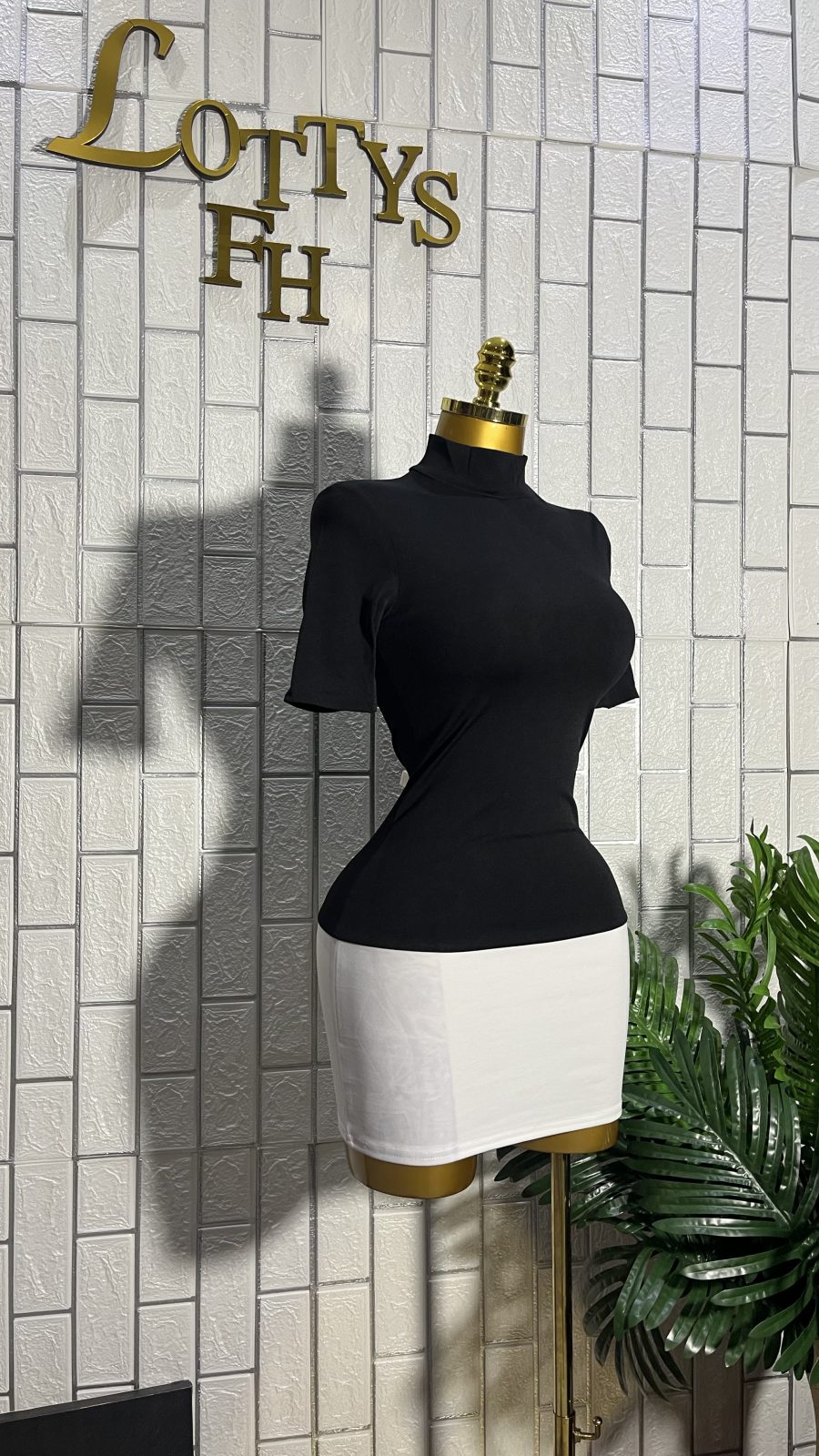 The BLACK CHIC Turtle Neck Top