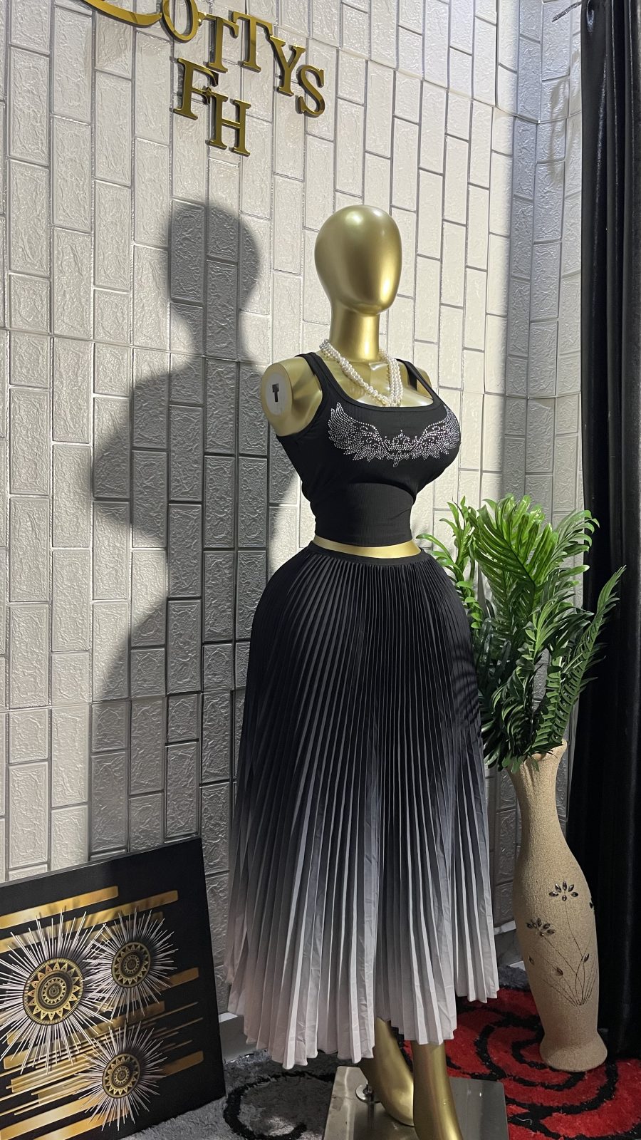 The OMBRÉ MUSE Pleated Flare Midi Skirt